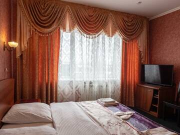 Фото номера Номер полулюкс Гостиница Форсаж г. Курск 4