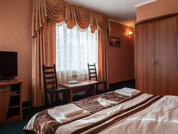 Фото номера Номер полулюкс Гостиница Форсаж г. Курск 5