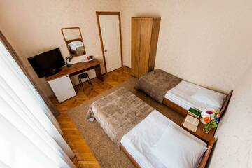 Фото номера Номер стандарт с 2 односпальными кроватями Гостиница  Bed and Breakfast  г. Курск 5